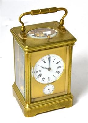 Lot 353 - A French brass alarm repeating striking carriage clock, movement stamped DC for Drocourt