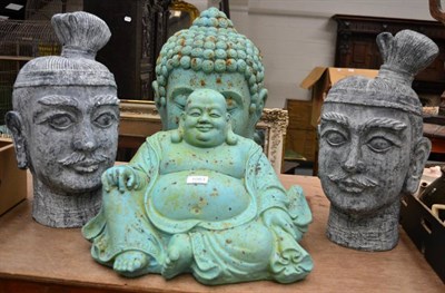 Lot 1083 - A group of four composition garden ornaments including two Chinese busts, a Buddha head and a...