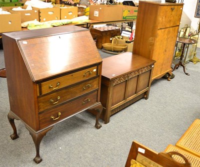 Lot 1102 - A bureau, a blanket box and a 1950s cocktail cabinet