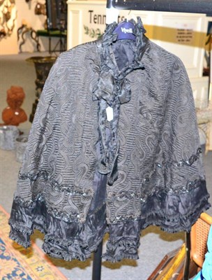 Lot 1108 - A mid 19th century cobalt blue silk two piece, comprising fitted long sleeved jacket (a.f.) and...