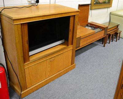 Lot 1113 - A modern bespoke oak television cabinet with twin tambour front containing a Bang & Olufson...