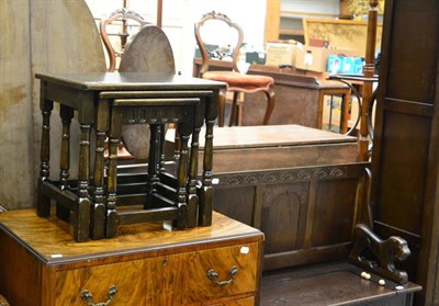 Lot 1133 - A group of carved oak furniture including a single wardrobe, a bespoke monk's bench and a nest...