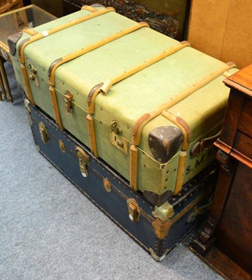 Lot 1139 - A wooden bound canvas travelling trunk together with a studded travelling trunk