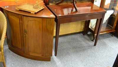 Lot 1145 - A mahogany foldover card table and a mahogany floor standing corner cupboard (possibly from A M...
