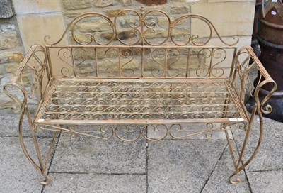 Lot 1156 - A folding painted metal garden seat