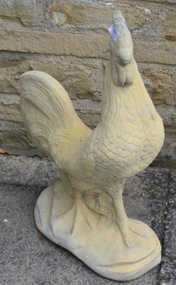 Lot 1165 - A pair of composition cockerel statues