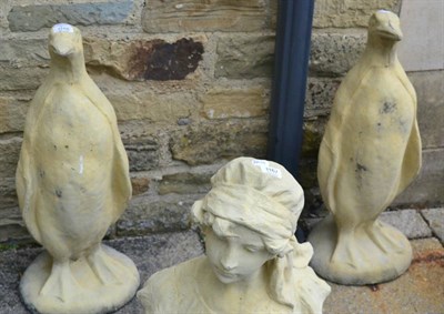 Lot 1166 - A pair of composition garden ornaments of penguins