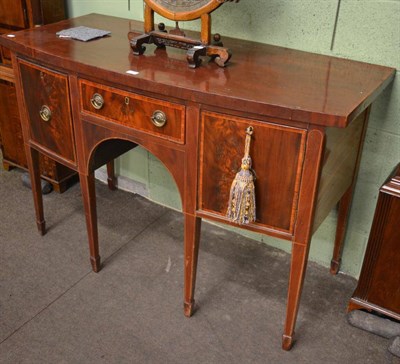 Lot 1298 - A mahogany bow fronted sideboard