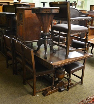 Lot 1310 - Oak draw leaf dining table and eight chairs in the Cromwellian style and a sideboard with...