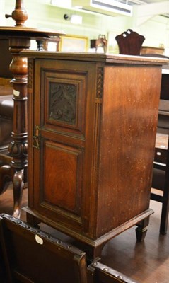 Lot 1312 - A late Victorian carved walnut bedside cabinet