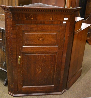 Lot 1315 - Georgian oak and mahogany straight front hanging corner cupboard