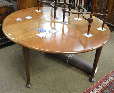 Lot 1319 - A mahogany drop leaf dining table