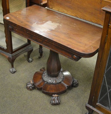 Lot 1328 - A mahogany fold-over pedestal tea table