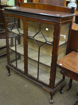 Lot 1329 - A glazed mahogany display cabinet