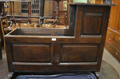 Lot 1330 - An early 19th century panelled oak crib