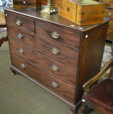 Lot 1353 - A Georgian mahogany four height chest of drawers