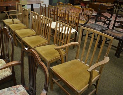 Lot 1372 - A set of six Georgian style dining chairs including two carvers, in a light oak