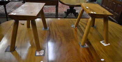 Lot 1395 - Two modern Yorkshire made oak stools, on four chamfered square section legs