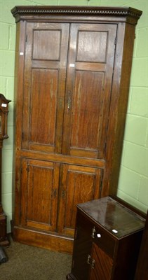 Lot 1409 - An 18th century free standing corner cupboard