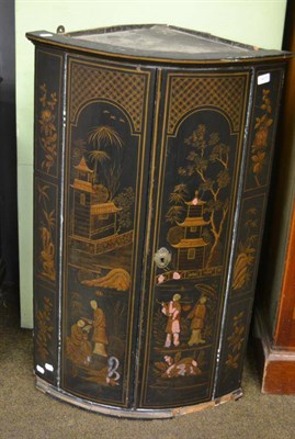 Lot 1413 - A 19th century chinoiserie bow fronted hanging corner cupboard