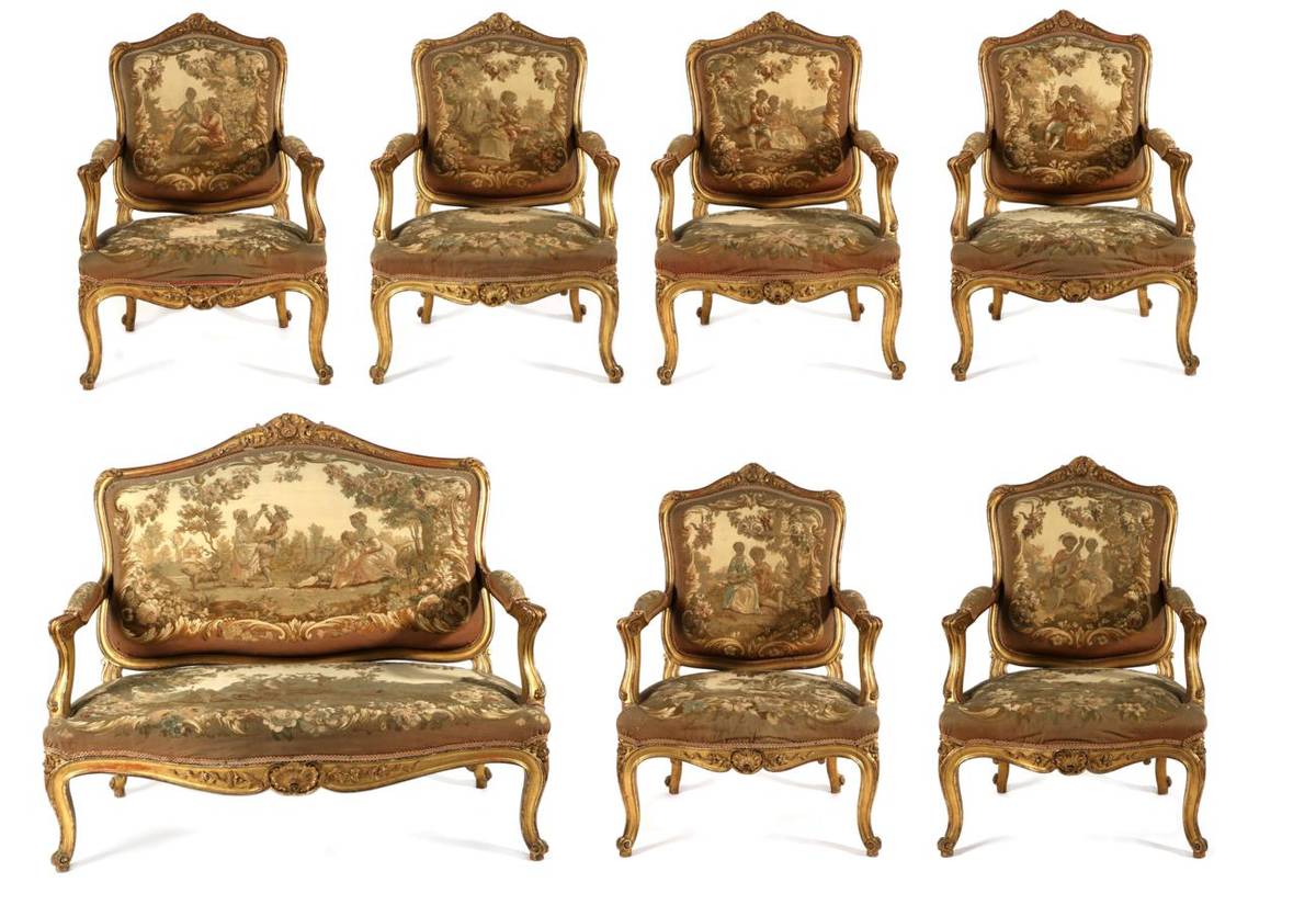 Lot 841 - <div>An Impressive Louis XV Style Carved Giltwood Seven Piece Salon Suite, late 19th century,...