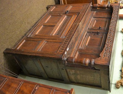 Lot 1419 - An 18th century carved oak court cupboard