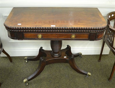 Lot 1426 - A Regency rosewood crossbanded plum pudding mahogany fold-over tea table