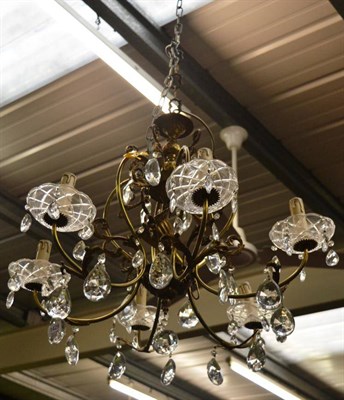 Lot 1429 - A gilt brass and cut glass six branch chandelier