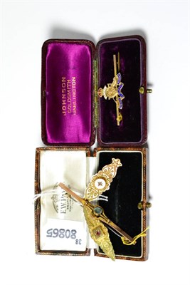 Lot 3 - A Regimental sweetheart brooch stamped '9CT' and three stone set brooches each stamped '9CT'