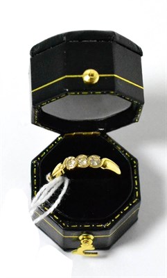 Lot 13 - An 18ct gold diamond three stone ring