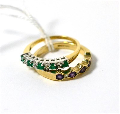 Lot 22 - A 9ct gold amethyst and diamond half hoop ring and a 9ct gold emerald and diamond half hoop ring