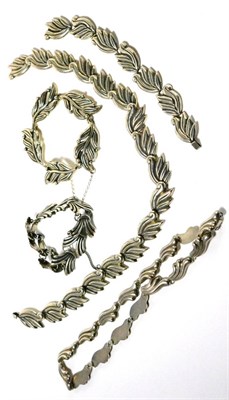Lot 29 - Three various Mexican silver bracelets together with two Mexican silver necklaces all of...