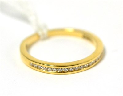 Lot 38 - An 18ct gold diamond half hoop ring