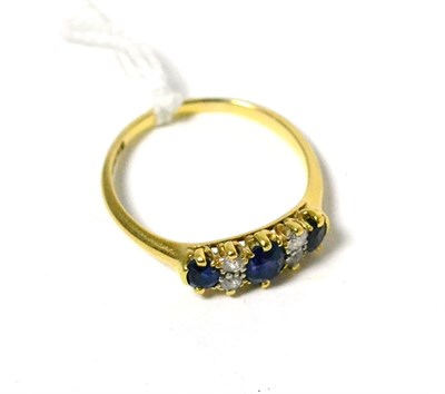 Lot 48 - An early 20th century sapphire and diamond ring, total estimated diamond weight 0.25 carat...