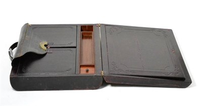 Lot 75 - A leather writing slope with Bramh patent lock