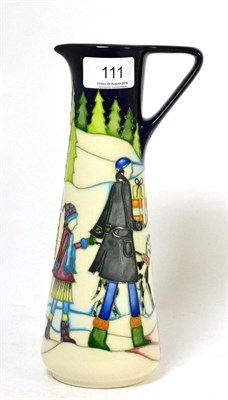 Lot 111 - A modern Moorcroft All Wrapped Up Chistmas pattern jug, designed by Paul Hilditch, numbered...