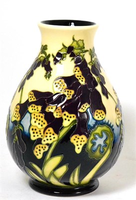 Lot 115 - A modern Moorcroft Fairies Foxglove pattern vase, designed by Kerry Goodwin, numbered 7/50, 19cm