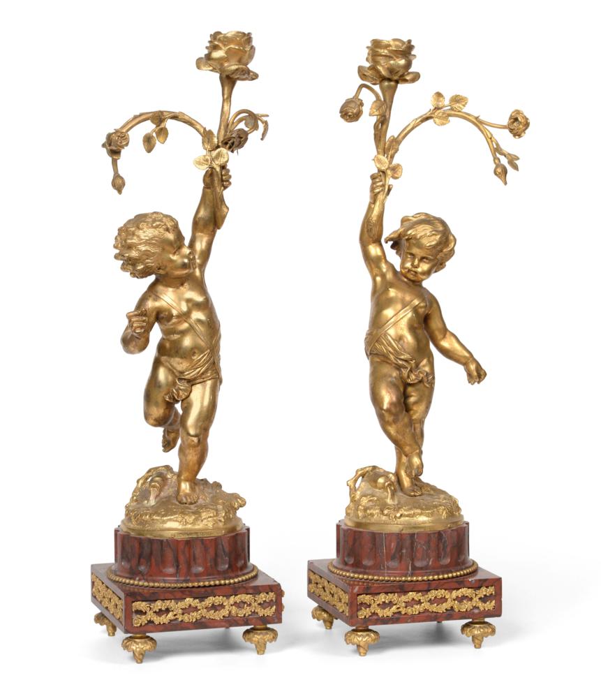 Lot 10 - Matharin Moreau (August Louis) 1834-1917: A Pair of Gilt Bronze Candelabra, in the form of cherubs