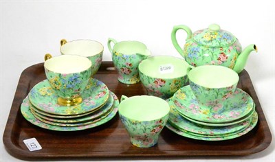 Lot 127 - A Shelley ";Melody"; pattern Chintz matched tea service and a Shelley ";Countryside"; pattern...