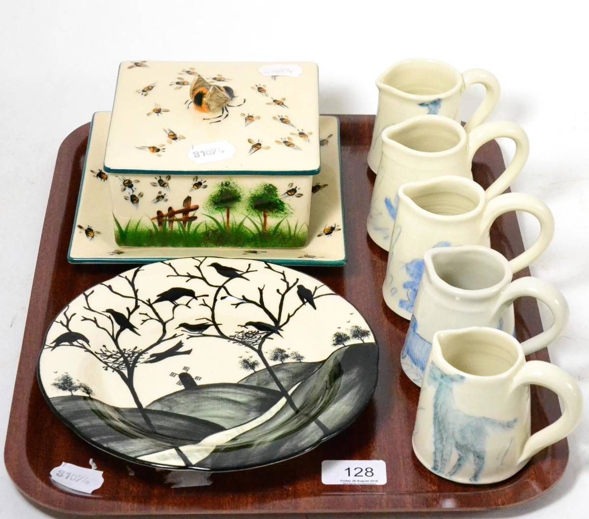 Lot 128 - A Griselda Hill pottery plate and butter dish and five studio pottery jugs