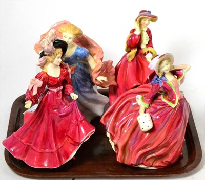 Lot 132 - Four Royal Doulton figures ";Autumn Breezes";, ";Top O The Hill"; HN1834, ";Patricia"; HN3365...