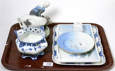 Lot 134 - Royal Copenhagen comprising girl and calf group and five other items including tray and inkstand