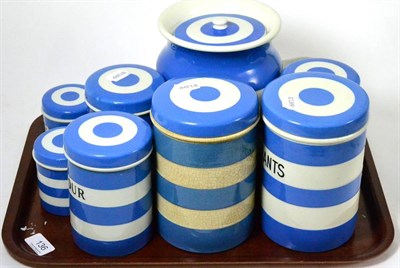 Lot 136 - A collection of nine Greener & Co Cornish ware storage jars and covers and a milk jug (a.f.)