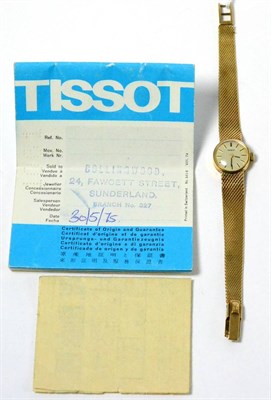 Lot 142 - A lady's 9ct gold Tissot wristwatch