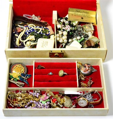 Lot 144 - A box of assorted costume jewellery including rings, lockets, brooches, beads, necklaces etc