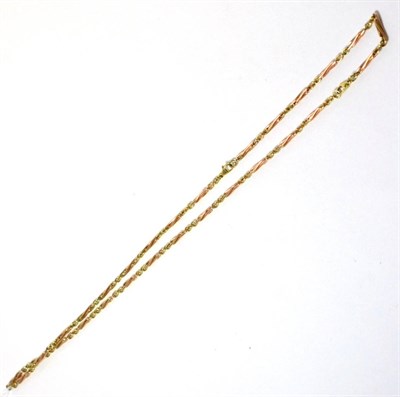 Lot 153 - A 9ct yellow and rose gold necklace and bracelet set