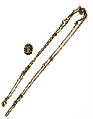 Lot 163 - A Victorian pinchbeck necklace together with a Victorian garnet mourning brooch (2)