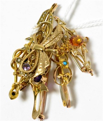 Lot 178 - An amethyst brooch, a turquoise brooch, a 9ct gold bow brooch, an amethyst and seed pearl...