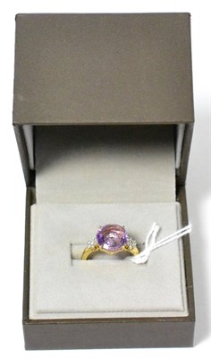 Lot 196 - An amethyst and diamond Lehrer Torus ring