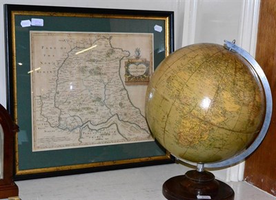 Lot 211 - A Philips' Challenge globe on an oak stand and a Robert Morden map of the East Riding of...